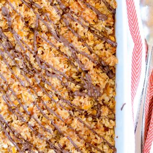 My favorite baked oatmeal recipe topped with caramel coconut and melted chocolate. It's like eating cookies for breakfast :)