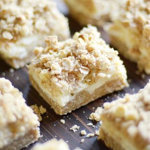 Oatmeal cookie crust, creamy white chocolate and lemon filling, and more streusel cookie crumble on top.