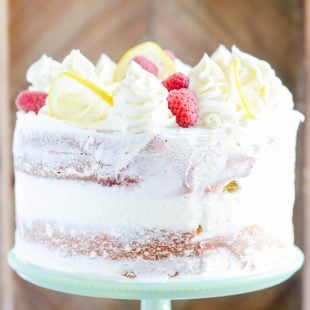 A rich lemon cake that tastes incredible with lemon cream cheese frosting and your favorite berries!