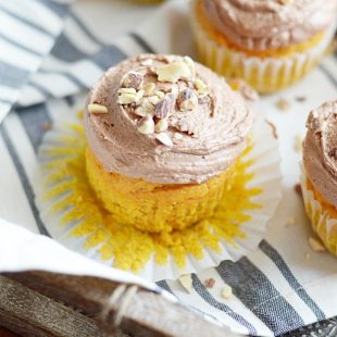 Soft and moist, spiced pumpkin cupcakes perfectly paired with whipped Nutella buttercream.