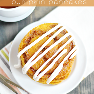 Buttery brown sugar and cinnamon swirled into fluffy pumpkin pancakes, topped with a dreamy cream cheese cinnamon roll frosting. Perfect for a yummy Fall breakfast!