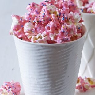 This Animal Cracker Popcorn is easy to make and a total crowd pleaser! From the Party Popcorn Cookbook