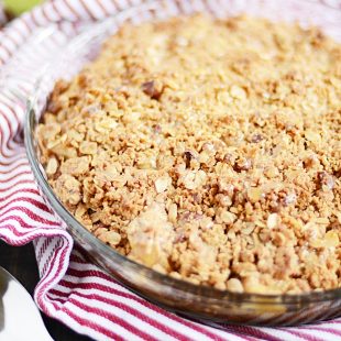 This is the very best Apple Crisp recipe of all time. There's a secret ingredient in the topping that keeps it extra crispy!!