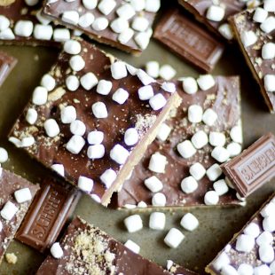 Crunchy, sweet, and easy brown sugar toffee made with graham crackers smothered in milk chocolate and topped with mini marshmallows. Better than campfire s'mores!