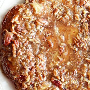 A recipe for quick and easy sticky buns using maple syrup, brown sugar, pecans, and store bought crescent roll dough.