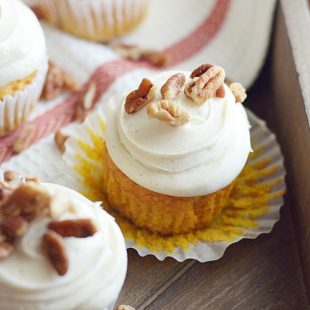 Soft and moist pumpkin cupcakes topped with my favorite cream cheese frosting and pecans.