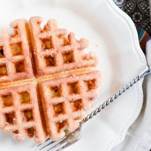 These waffles are so easy to make and absolutely melt-in-your-mouth incredible. My favorite Belgian Waffles dipped in butter and coated in cinnamon sugar.