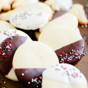 This easy shortbread has become one of my favorite Christmas cookies! It's easy to make and it tastes SO GOOD. Dip it in chocolate and add sprinkles to make any holiday plate prettier :)