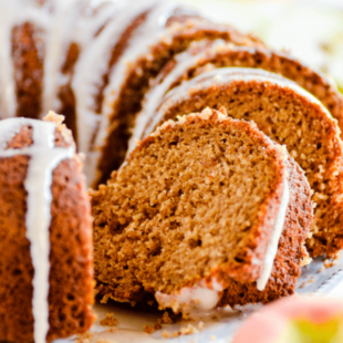 This Apple Spice Cake with Maple Cinnamon Glaze is your new go-to Fall recipe for EVERYTHING. Supremely moist and flavorful!